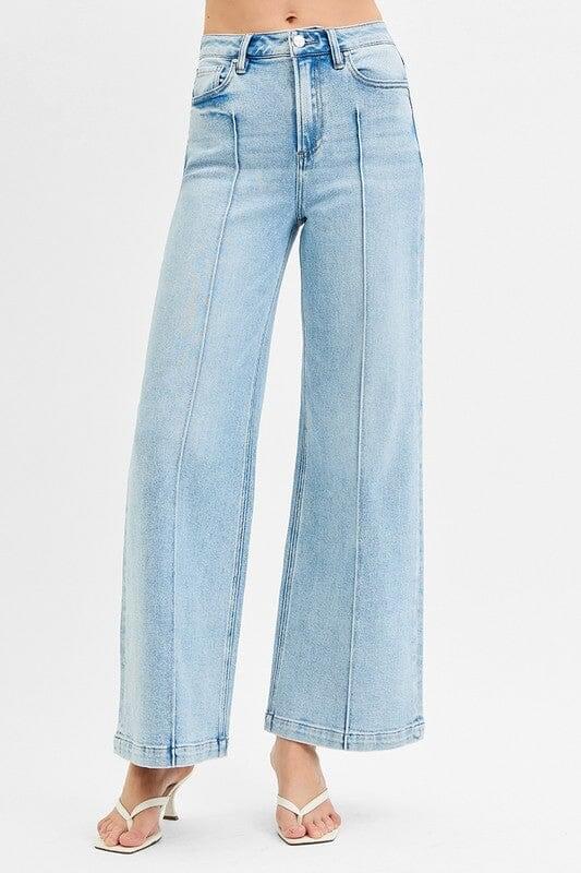 Upgrade your denim rotation with these vintage-inspired wide-leg jeans featuring a sophisticated, leg-lengthening pintuck detail. Engineered with a premium comfort-stretch blend and a flattering high-rise fit, they offer a polished silhouette that transitions effortlessly from day to night.